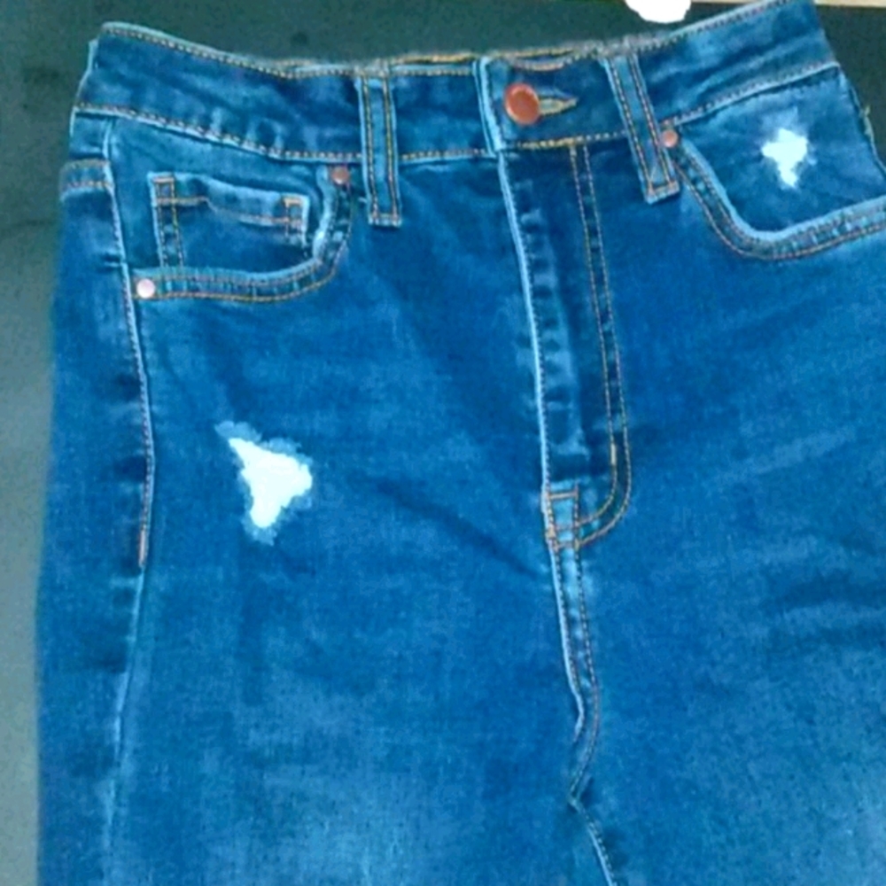 Ripped Dark Blue Jeans